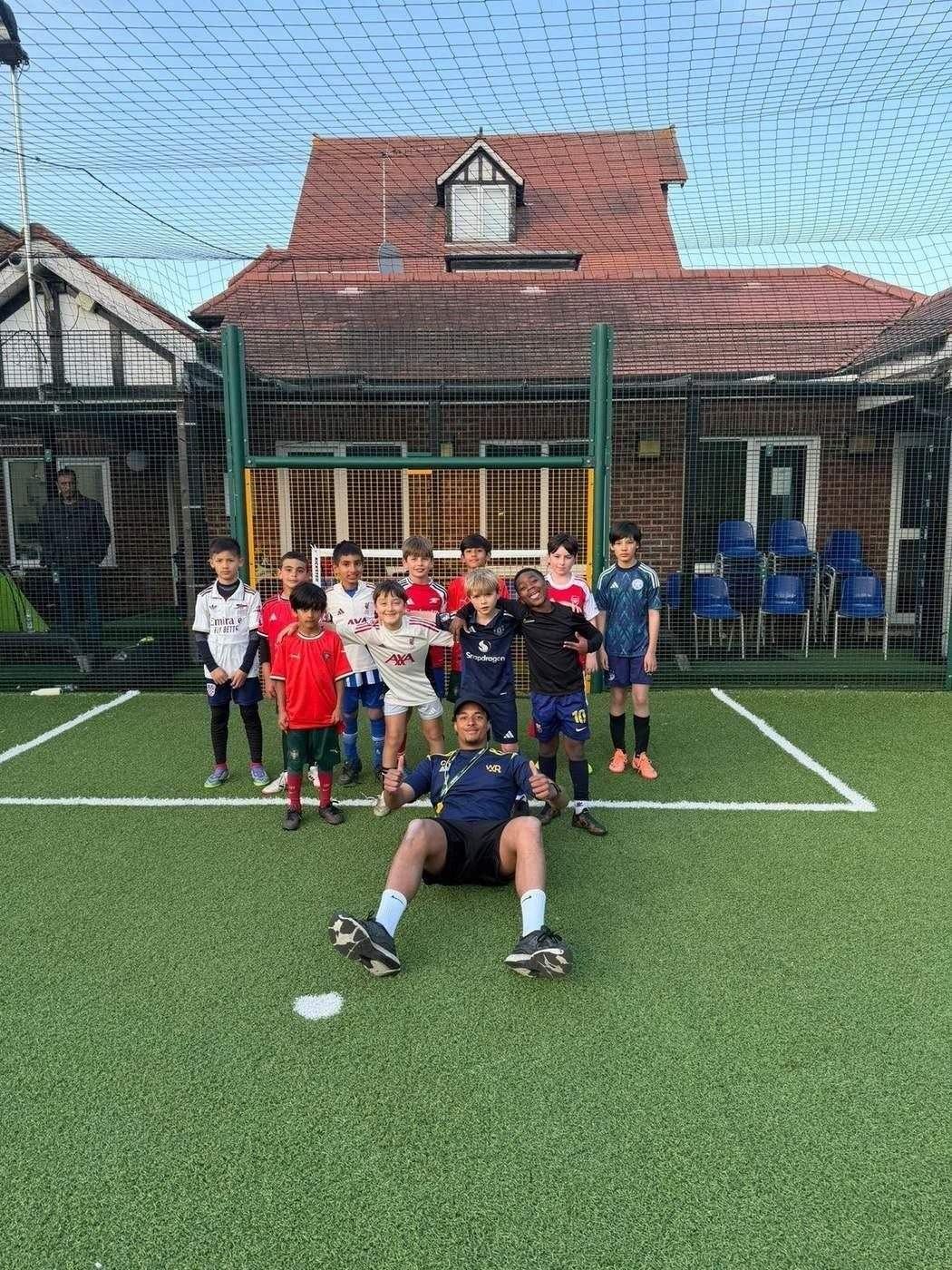 WorkRate Coaching youth football group with their coach at Mora sessions